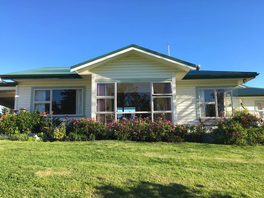 The front of the guesthouse viewed as you come up the sweeping driveway.