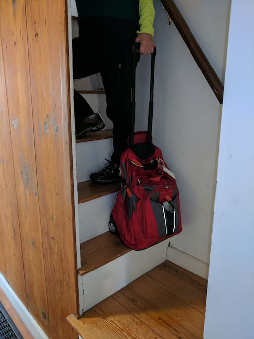 Steep, narrow stairs up to Artsy upstairs bedroom - and down to shared bath.