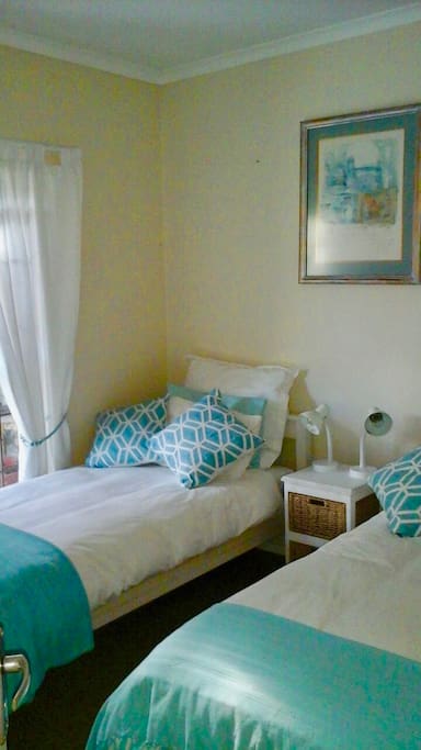 Second bedroom with two single beds