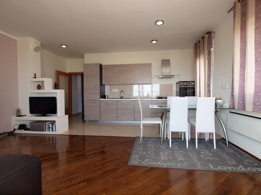 Open concept living room with TV & internet