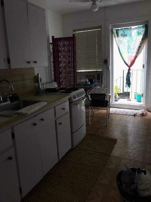 Kitchen area and the balcony/patio area.