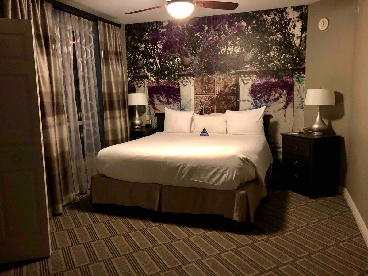 Master bedroom of a 2 bedroom deluxe unit