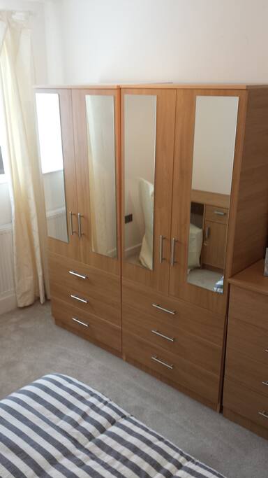 Wardrobe space and full lentgh mirrors.