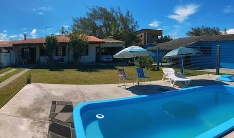 House with pool, near the seashore.