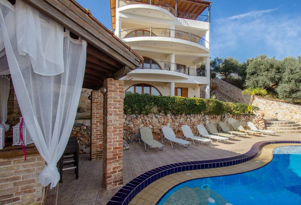 A charming pool, pool bar, outdoor furniture, barbecue facilities