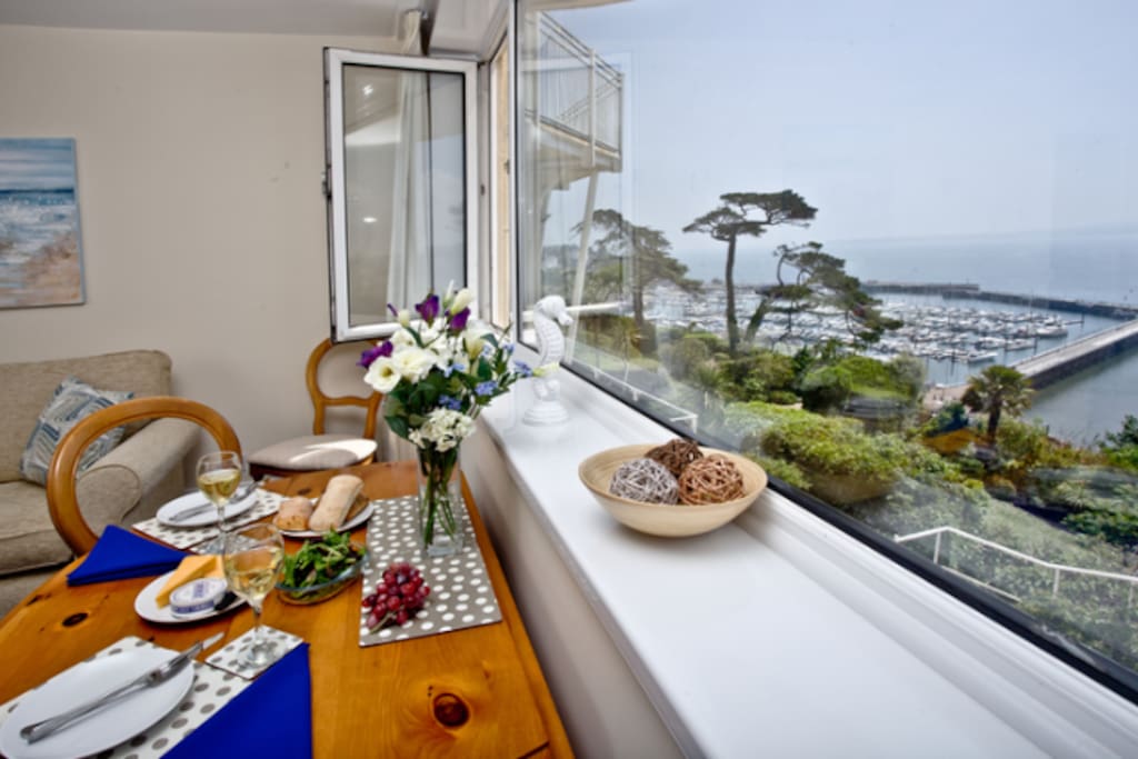 Open plan living and dining area, with the amazing views