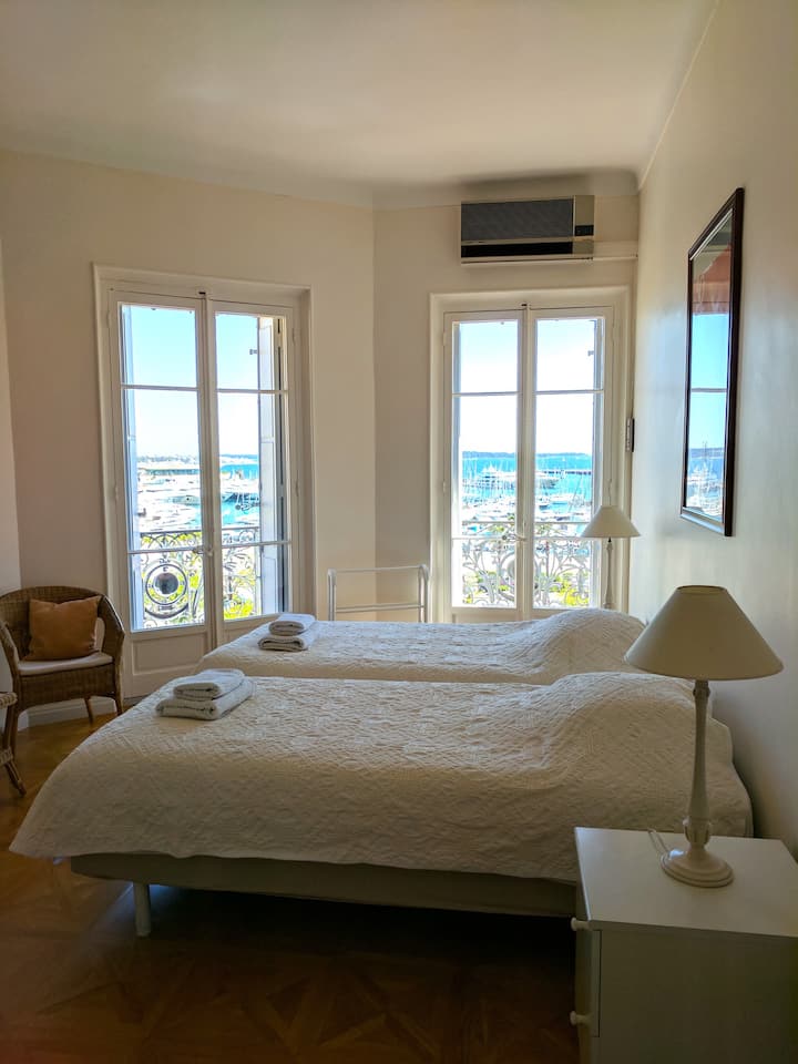 Bedroom 2 - Large corner double bedroom with twin beds, plenty of closet space and sea view.