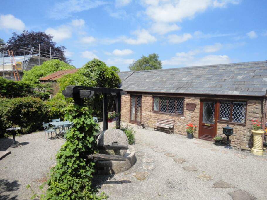Courtyard setting with cidermill & press