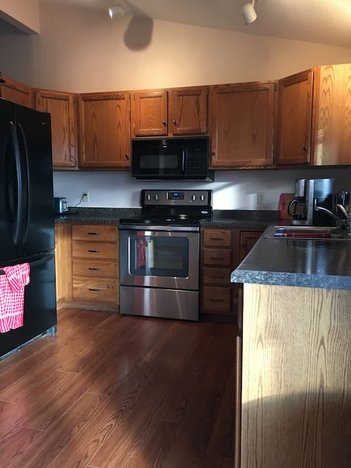 Updated kitchen with quality appliances, and all the plates, serving dishes, pots, pans and the like.