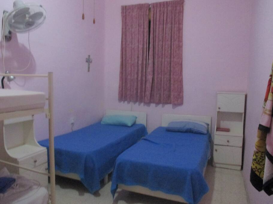 The room is quite big, and you will have 3 wardrobes to store your clothes.