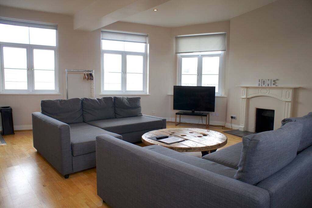 Here's your living room with two double sofa-beds