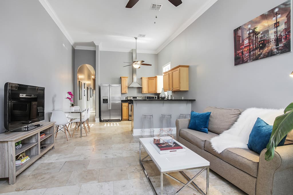 Inviting and spacious living room & kitchen filled with natural light