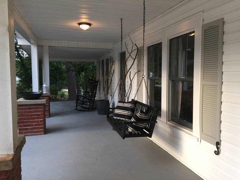 Front porch, swing and rocking chairs...