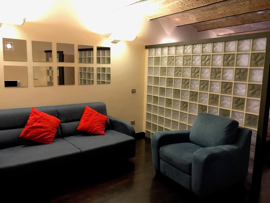 Living room and wall glass which separates from the bedroom