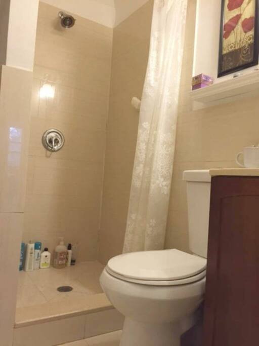 Shares Bathroom. Great shower!