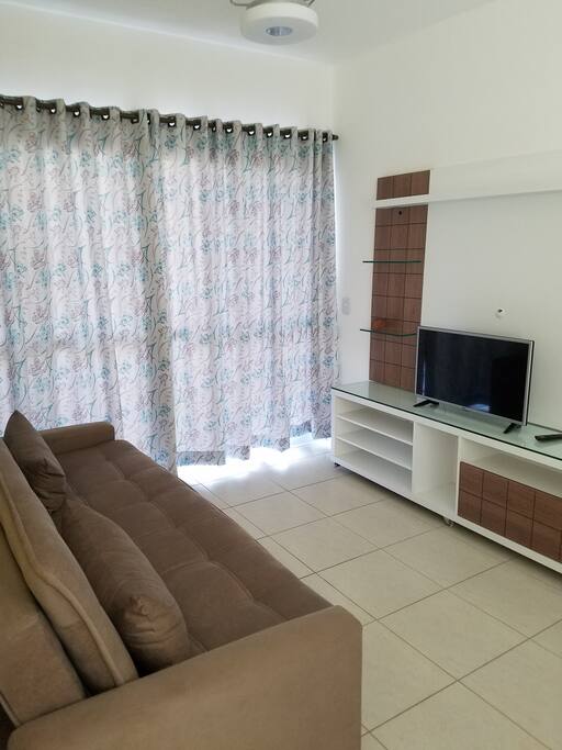 Sala com cortina blackout