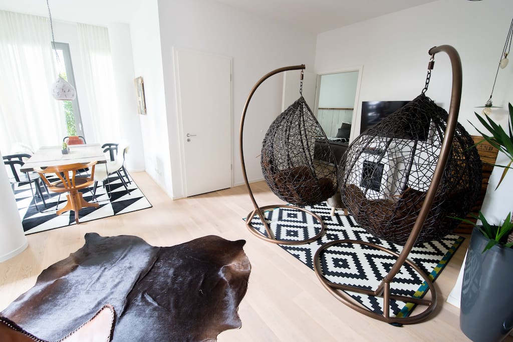 Bright living room space. Air mattress fits comfortably here.