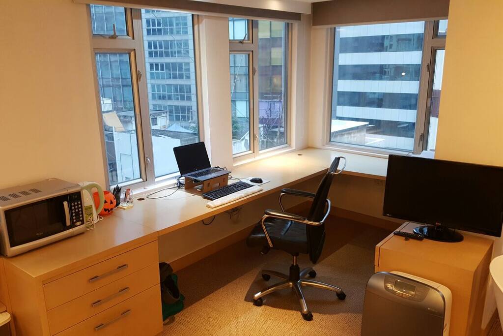 Enormous study area with wrap around desk and external keyboard and mouse provided