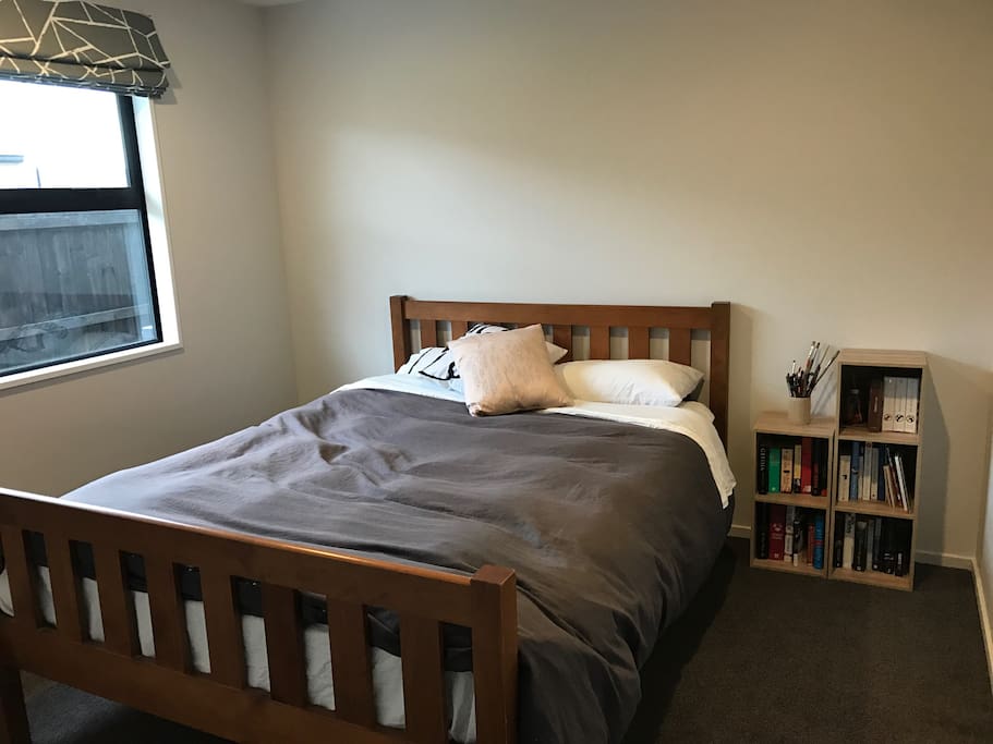Your room, queen bed with wardrobe