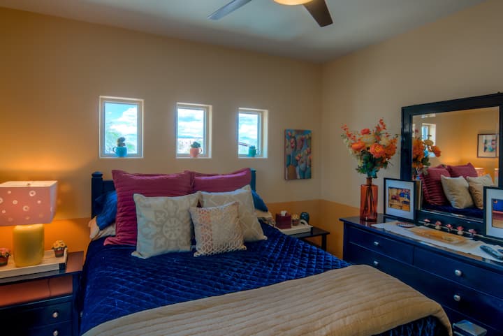 The Prickly Pear Bedroom has a Vintage Florence, Italian Hand-Crafted Queen Bedroom Set. Cactus Decor with Whimsical Motifs.  Mountain Views from the Pocket Windows