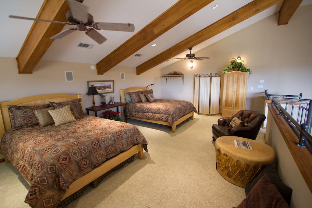 Upstairs loft with two queen beds.