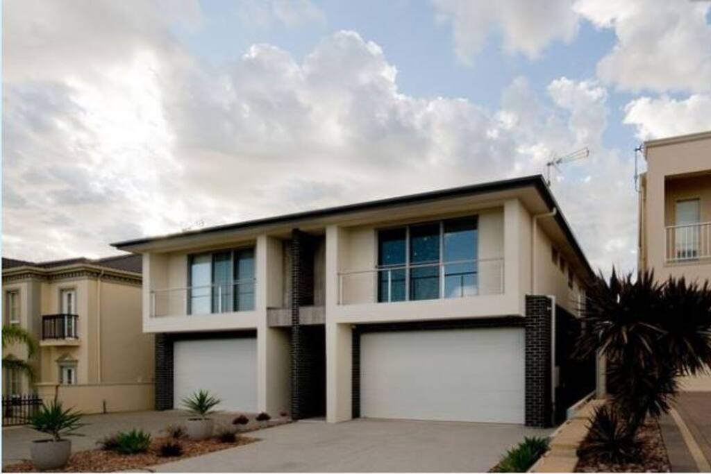 large double garage and a long driveway for boat storage.