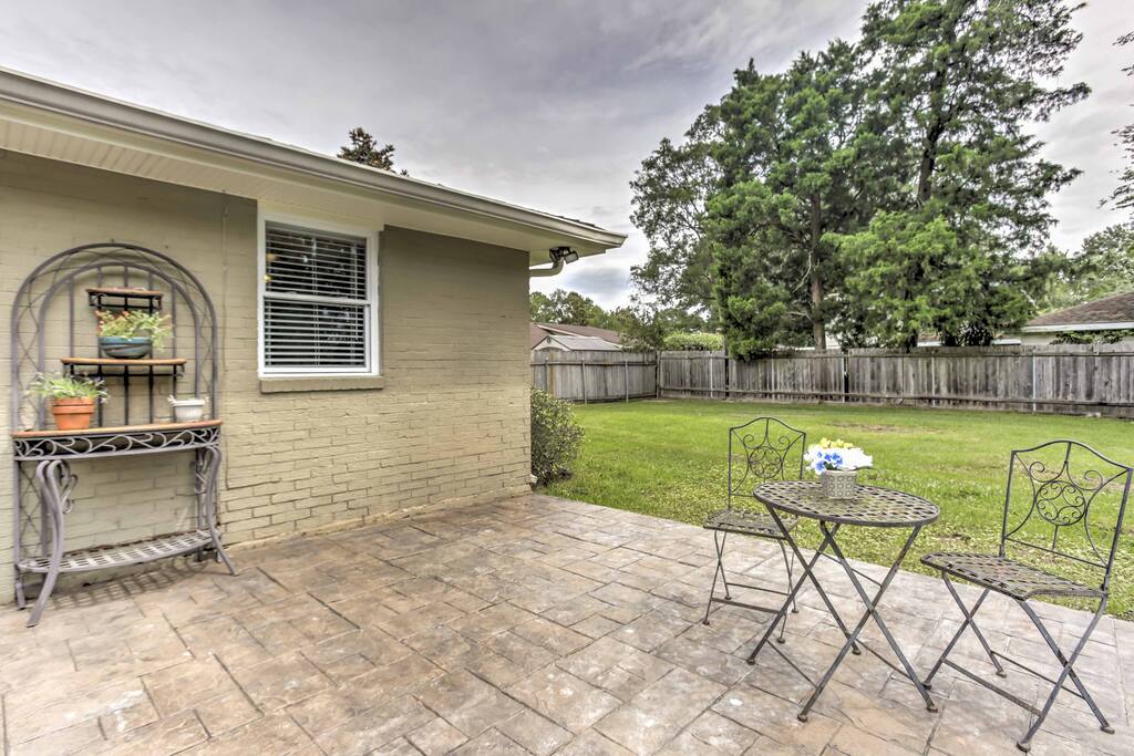 Spend your days relaxing in the backyard and sipping your favorite cocktails on the patio.