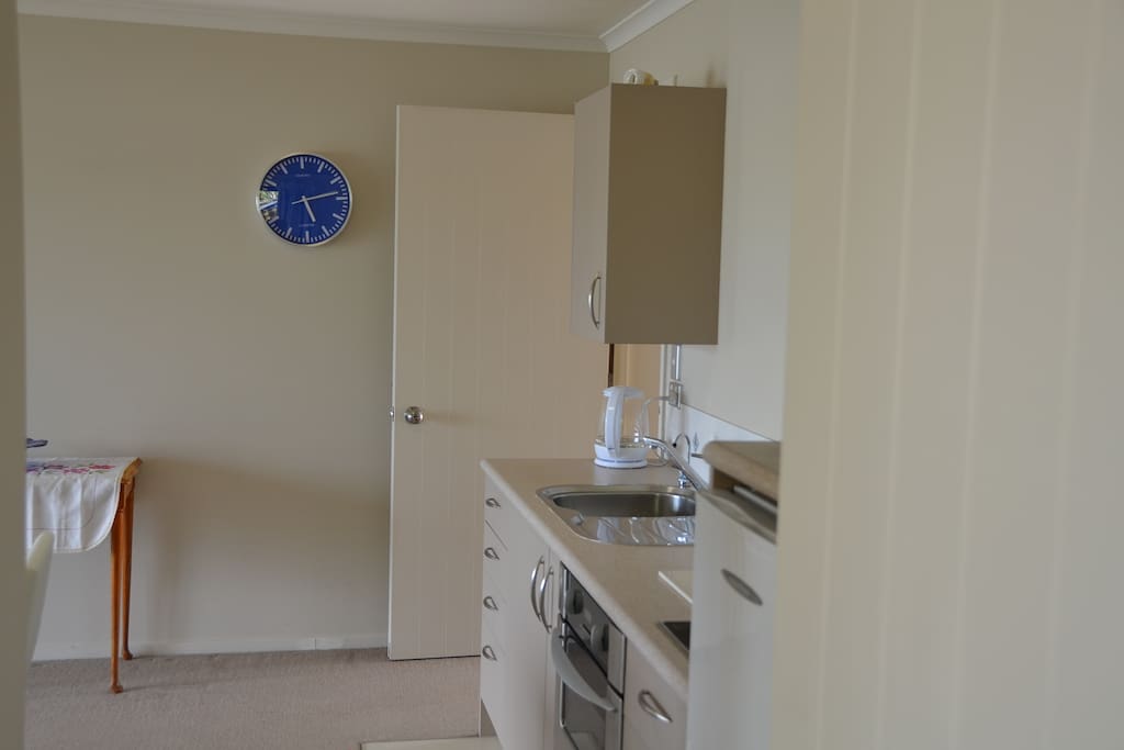 Microwave, stove, fridge and hot top plate