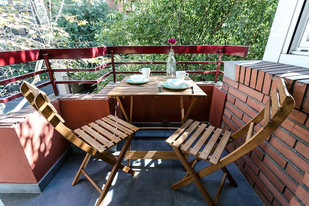 Cosy balcony with table for 2
