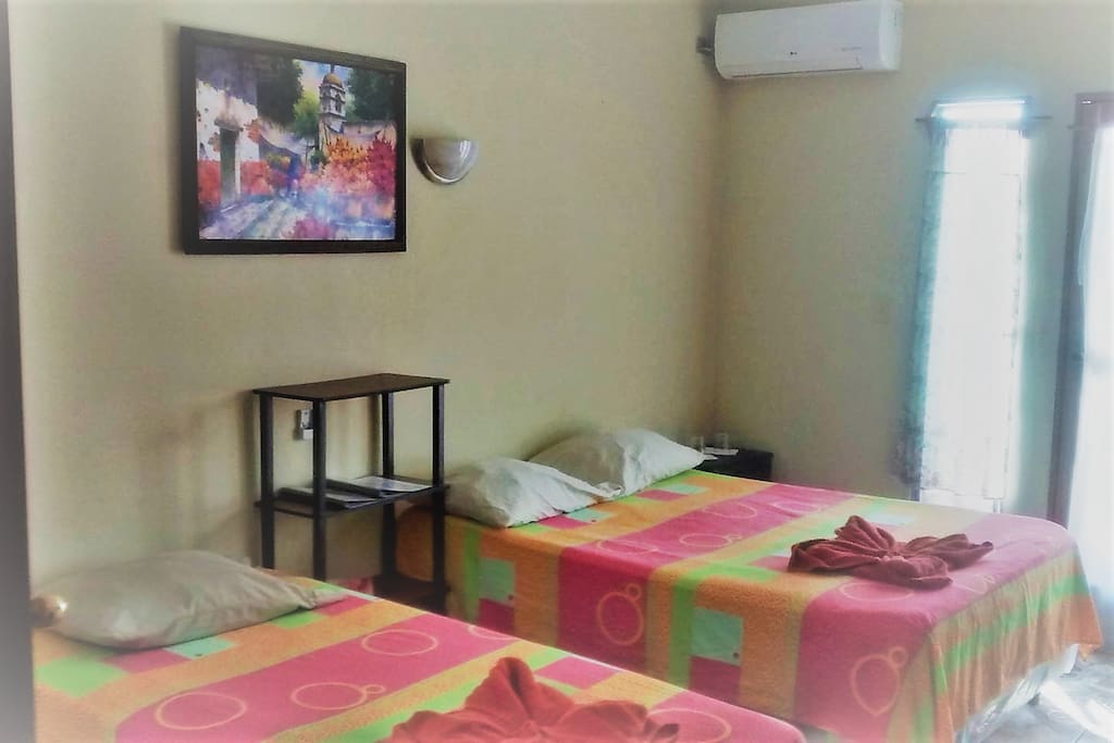 Lakeview Room Top Level, brand new very powerful LG Air Condition Unit, Private Bath with Hot Shower, Westside Balcony with Table and Chairs to dine outside. See the Sun set with a chilled bottle of good Chilenean Wine!