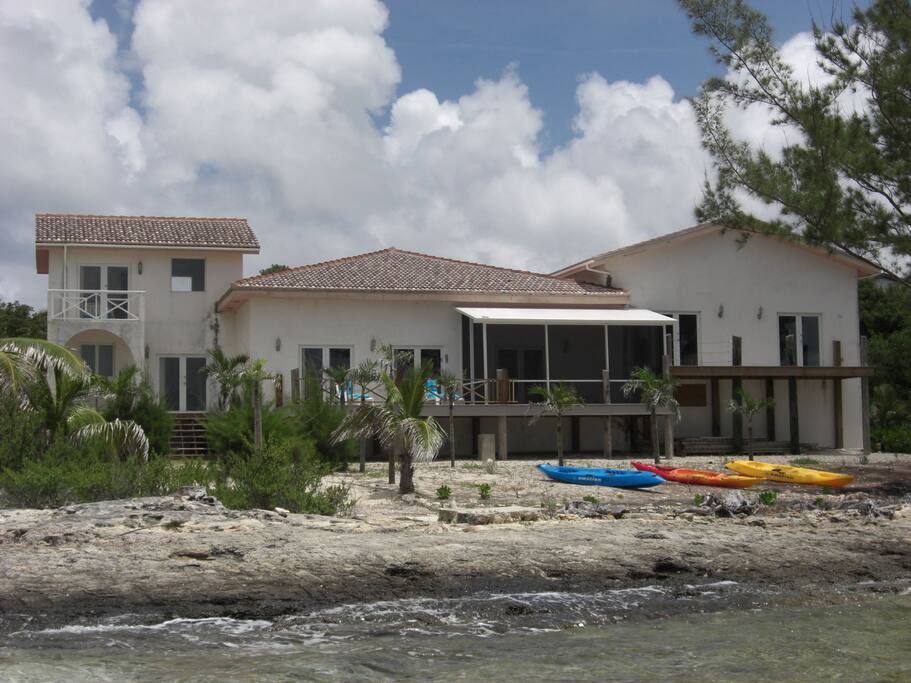 Guest house is 2 floor villa on left; view from ocean
