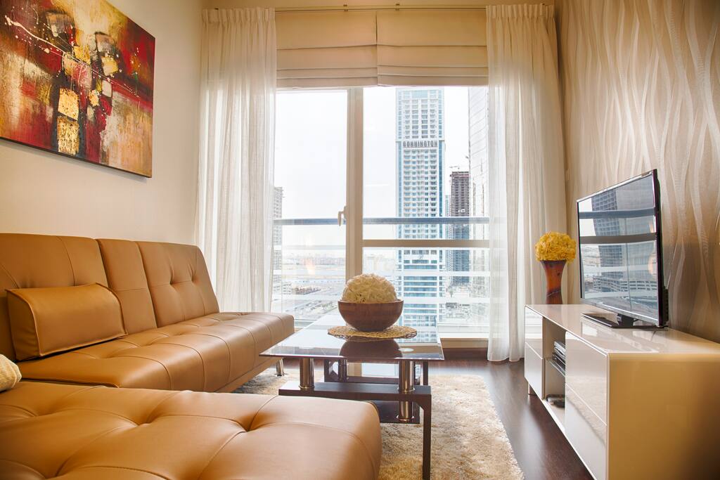 Relax or work on the comfortable leather sofa. Flat screen TV with 200+ channels + DVD player
