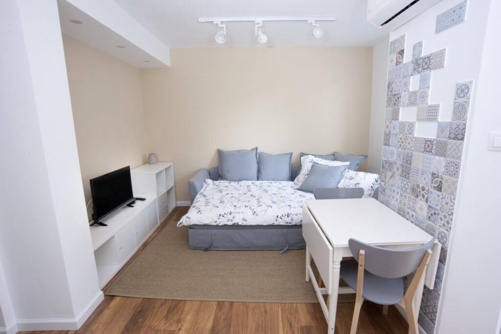 Pulled-out sofa bed