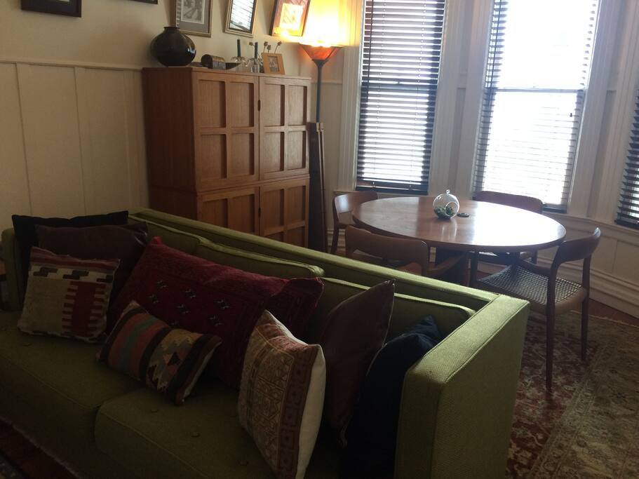 The dining table can expand to seat a larger group. This room is directly off the kitchen.