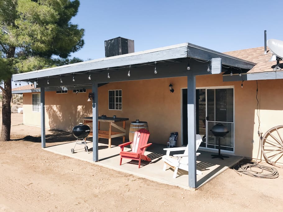 Back patio overlooks rolling desert hills
