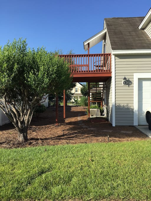 Deck and back yard by driveway