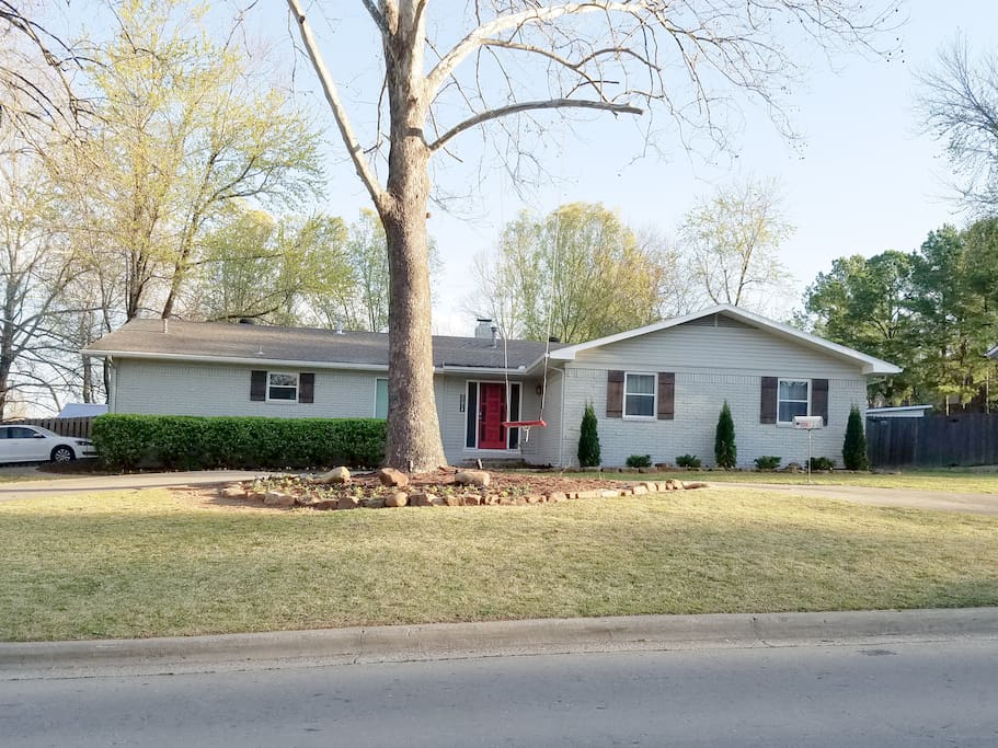 Large yard and two driveways with ample parking.