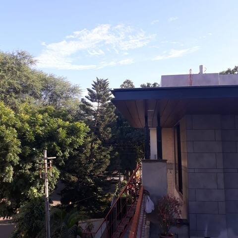 Two spacious rooms & a big patio in a bungalow.