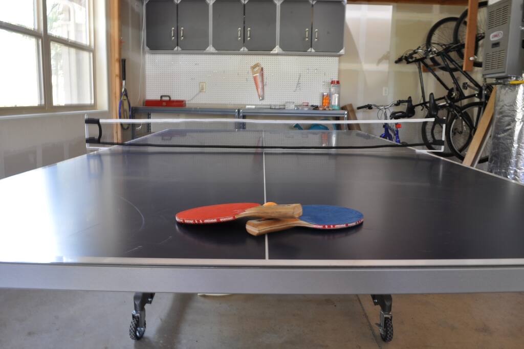 Ping pong table in the garage.