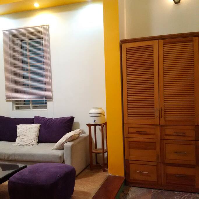 The sofa at sitting room-shared area