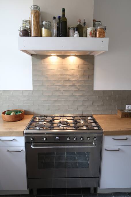 Kitchen with a great oven you can use for pizza or baking your own cake :-).