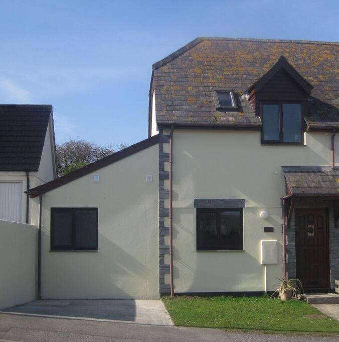 Front of house with parking