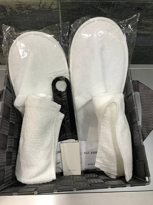 slippers, face towels, sewing kit, shoe horn, shower cap, vanity kit, shoe mitt