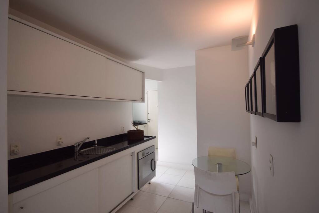 Modern stove, coffee machine, contemporary arts and minimalist style.
