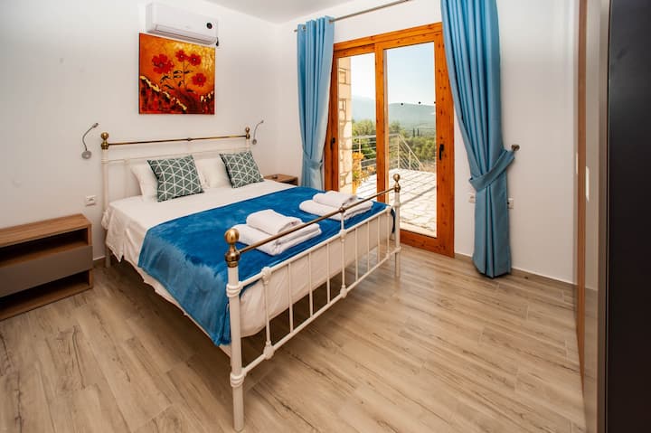 Bedroom 2 with access to the main terrace and sea views