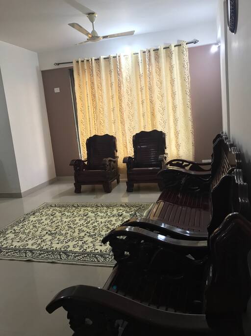 Living Room with Wooden Sofa Set