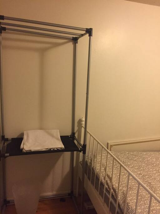 rack for clothes, hangers will be provided