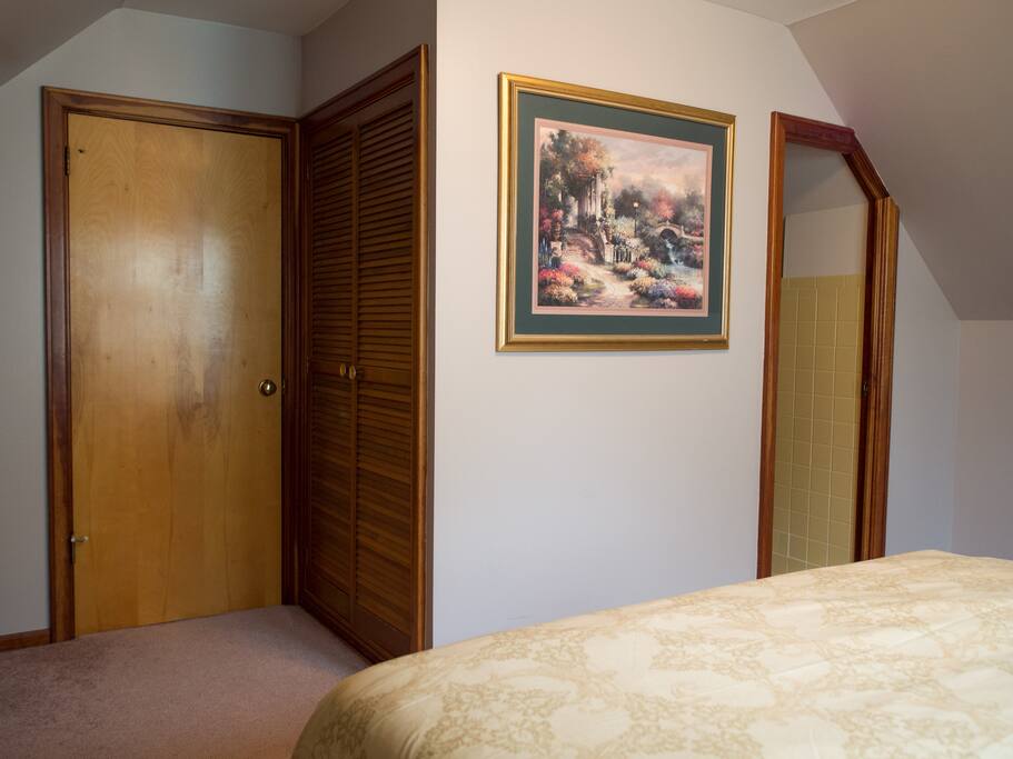 Private room with a queen bed and a full bathroom