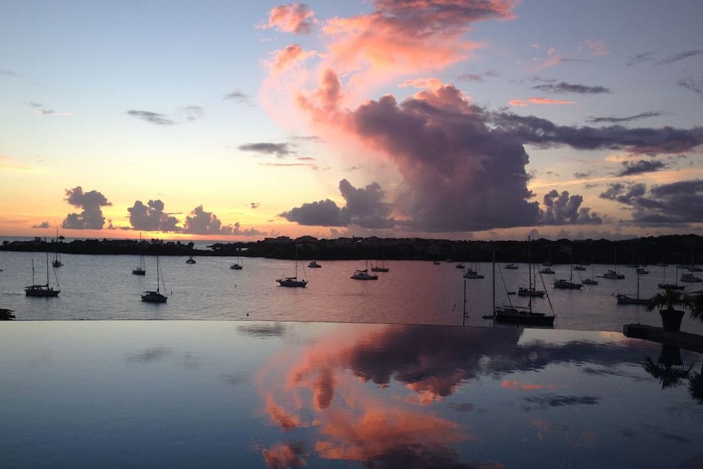 Soothe yourself with spectacular sunset views reflected in the Grand Infinity Pool overlooking Prickly Bay and the Caribbean Sea -