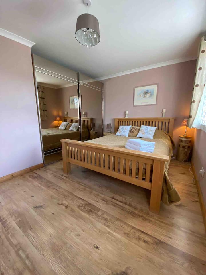 Dormitorio principal con cama king size